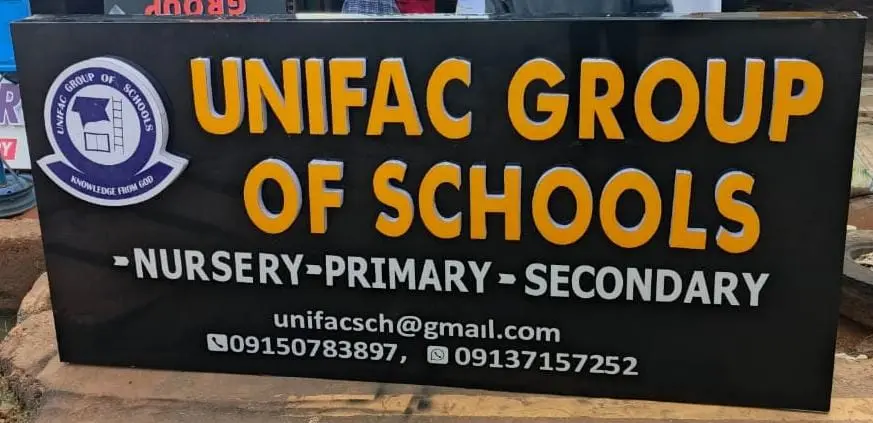The Unifac Group of Schools signboard, reading Nursery, Primary, Secondary
